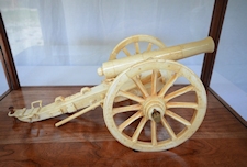 Cannon In Glass Case